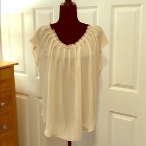 Sheer summer blouse in creamy pink.